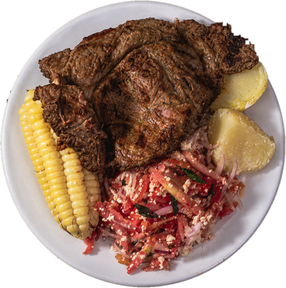 Churrasco con choclo, papa y ensalada valluna