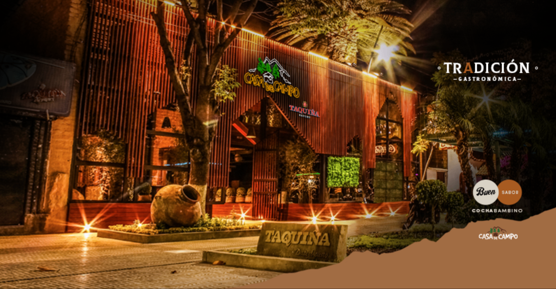 Entrada iluminada de Casa de Campo en el Boulevard de la Recoleta, Cochabamba